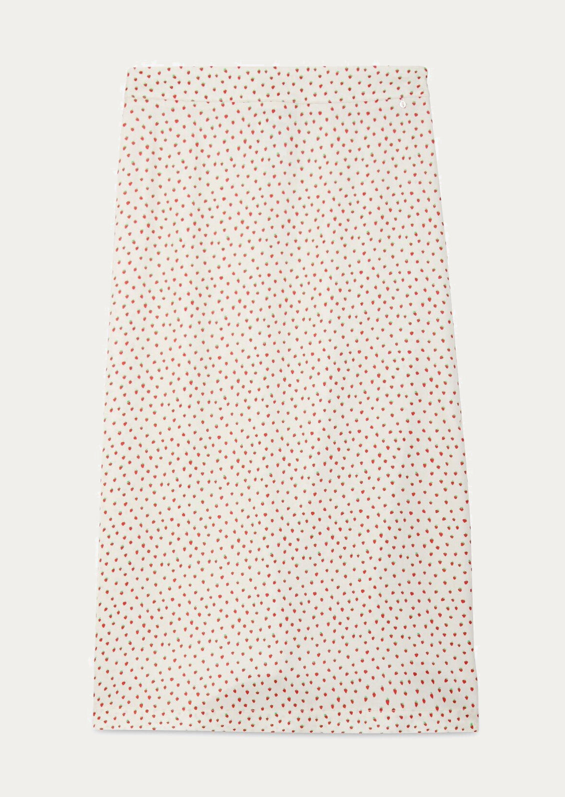 An ivory slip skirt with small red strawberry print.