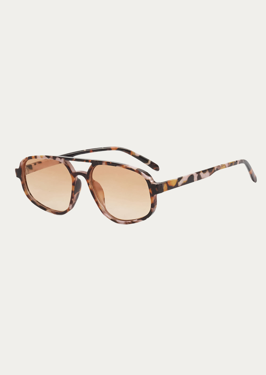 A pair of aviator style sunglasses with a marble tortoise frame and light brown tinted lenses.