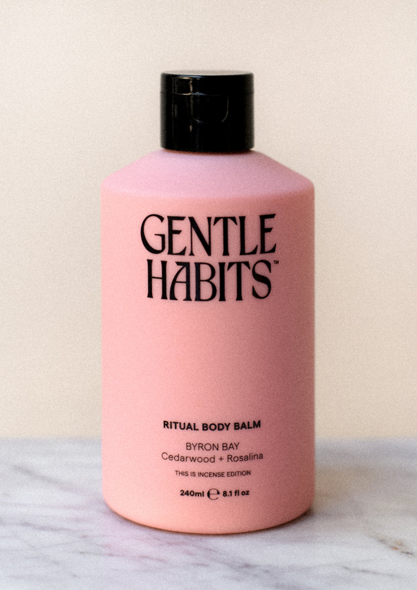 A bottle of body lotion in pink.
