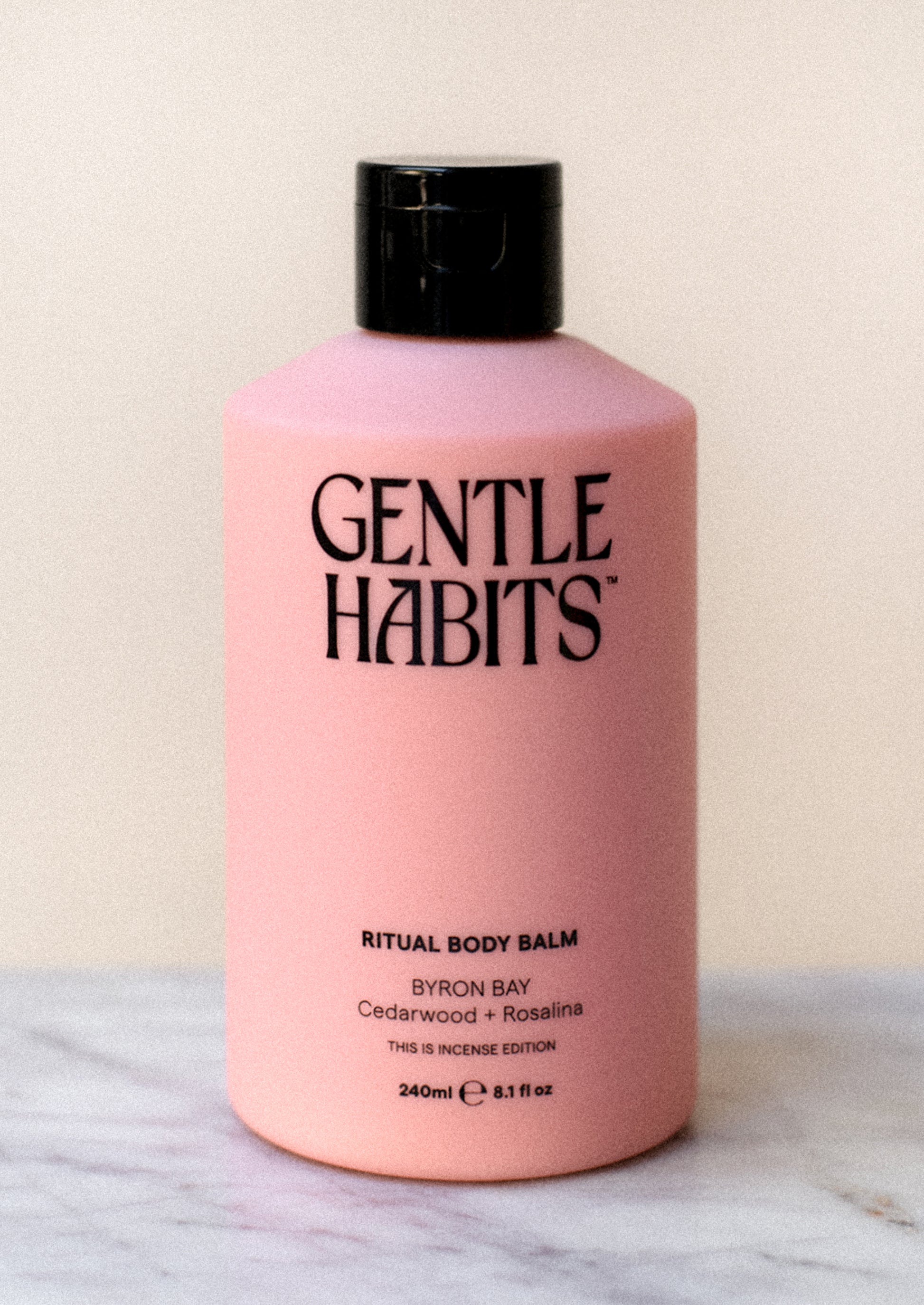 A bottle of body lotion in pink.
