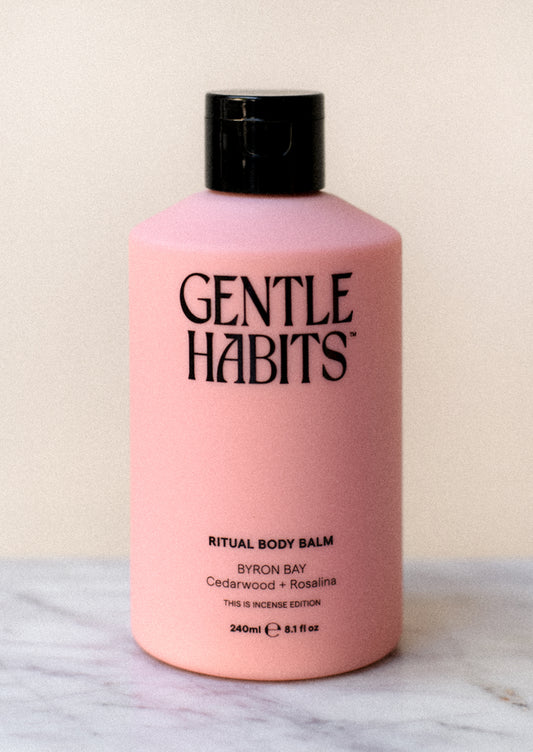 A bottle of body lotion in pink.