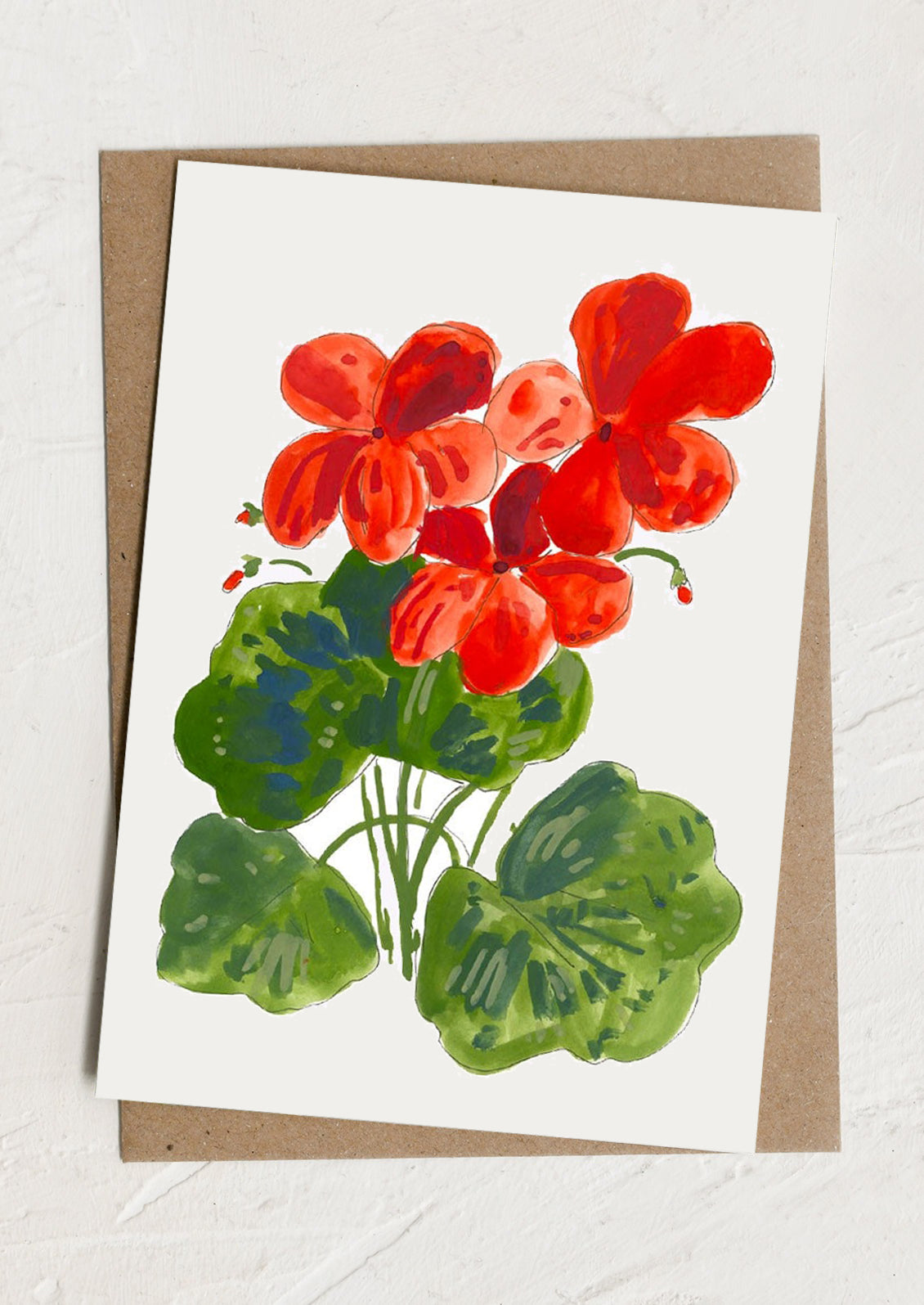 Card with red flowers and green leaves on a white background