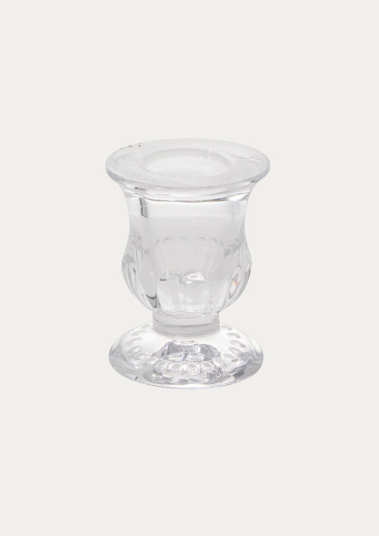 A clear glass candleholder with classic shape.