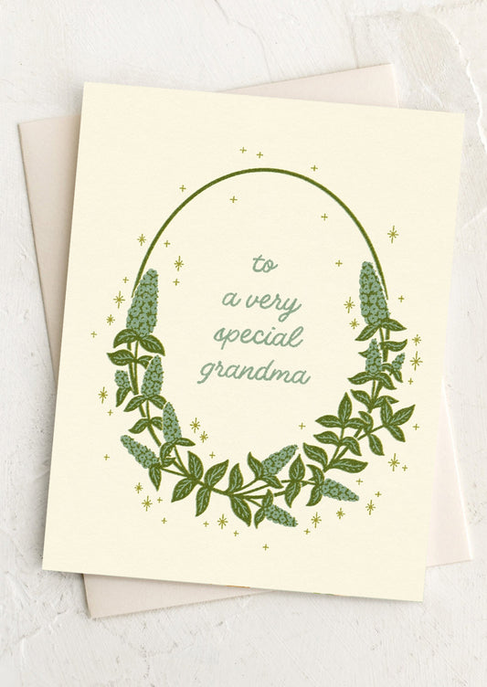 Greeting card with green leaf design and text 'to a very special grandma' on a light background