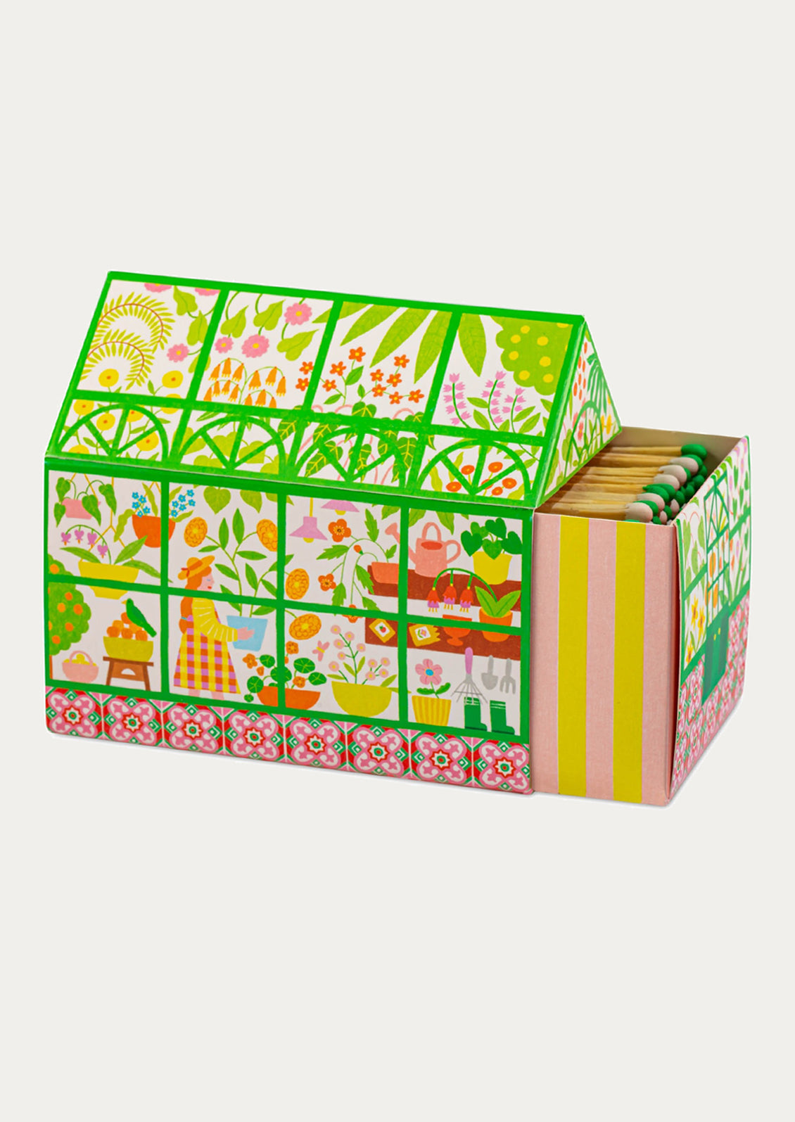 A box of matches shaped like a house, illustrated to depict a greenhouse.