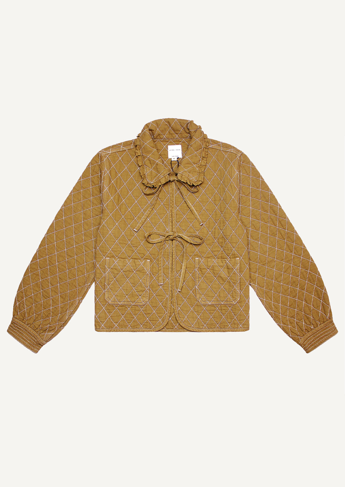 An ochre colored jacket with diamond quilting and bow tie front.