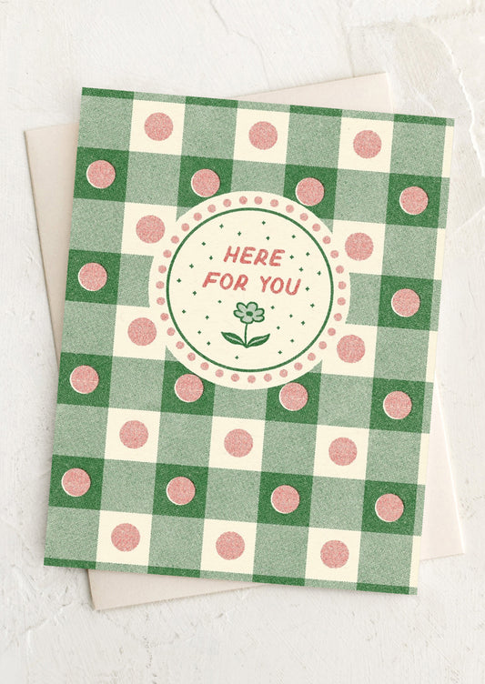 Greeting card with green and white checkered pattern and 'Here for You' text on a white background