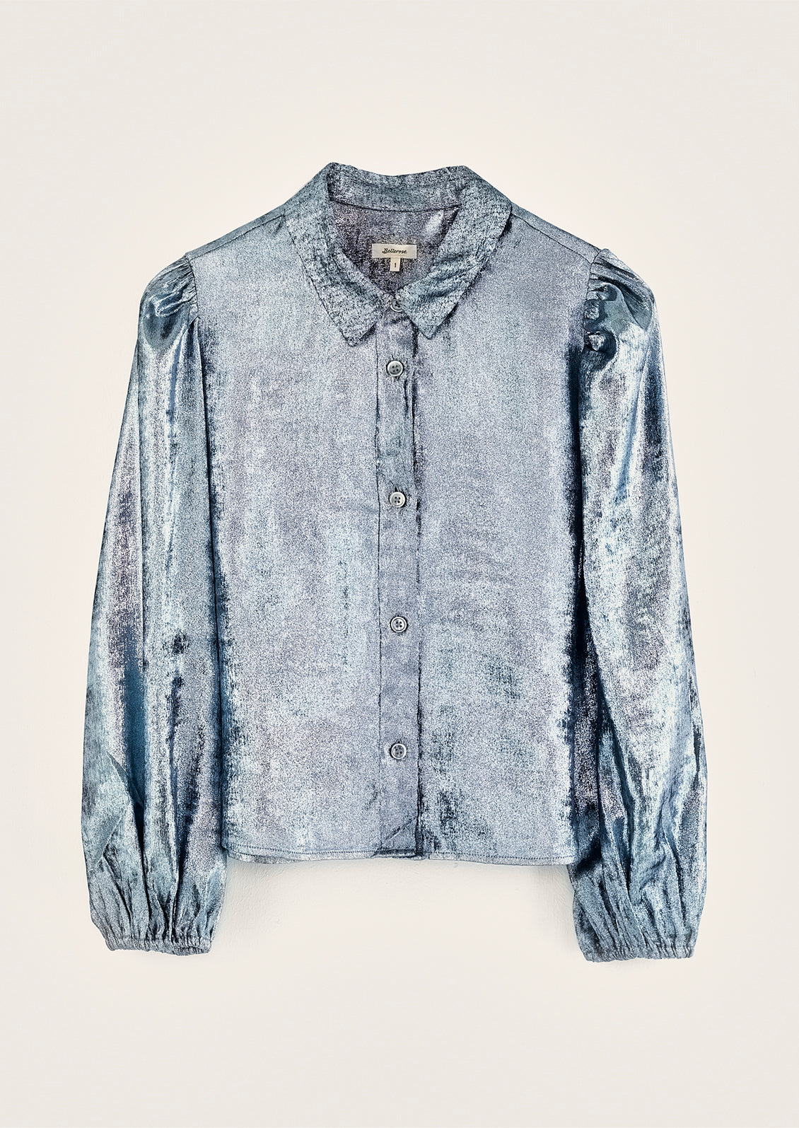 A metallic blue collared blouse.