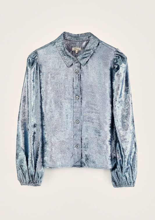 A metallic blue collared blouse.