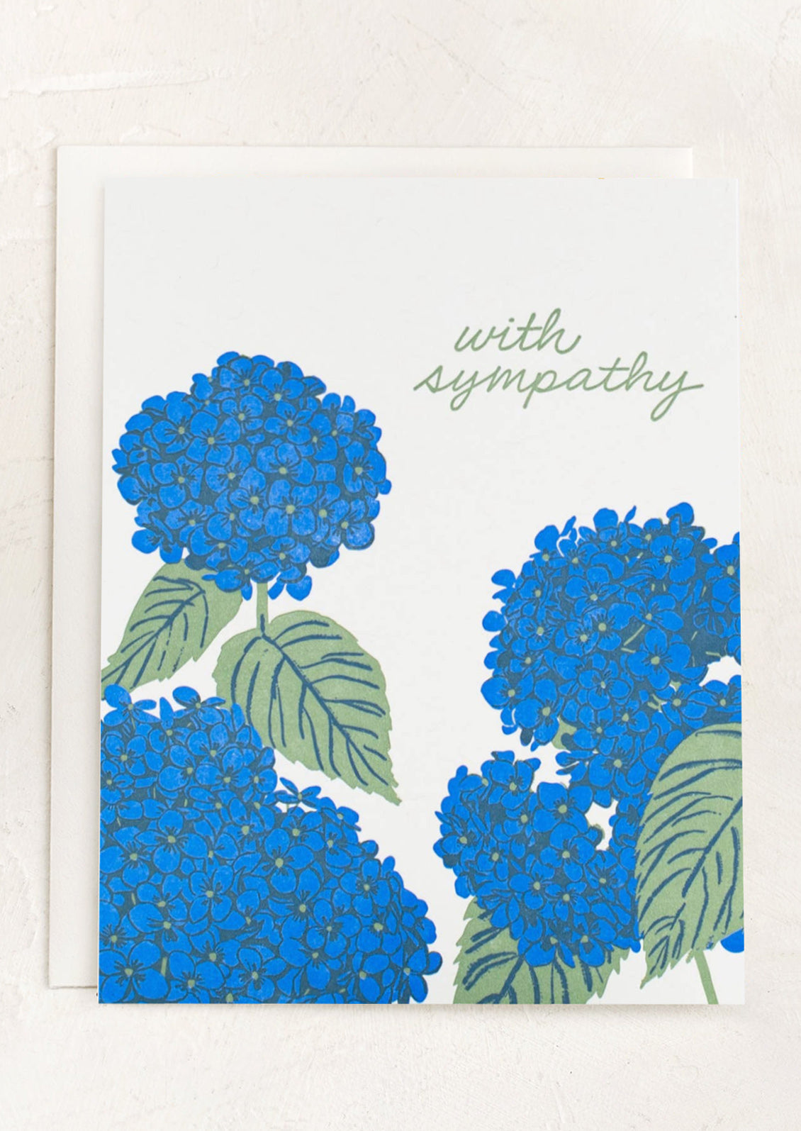 Card with blue hydrangea flowers and 'with sympathy' text on a white background