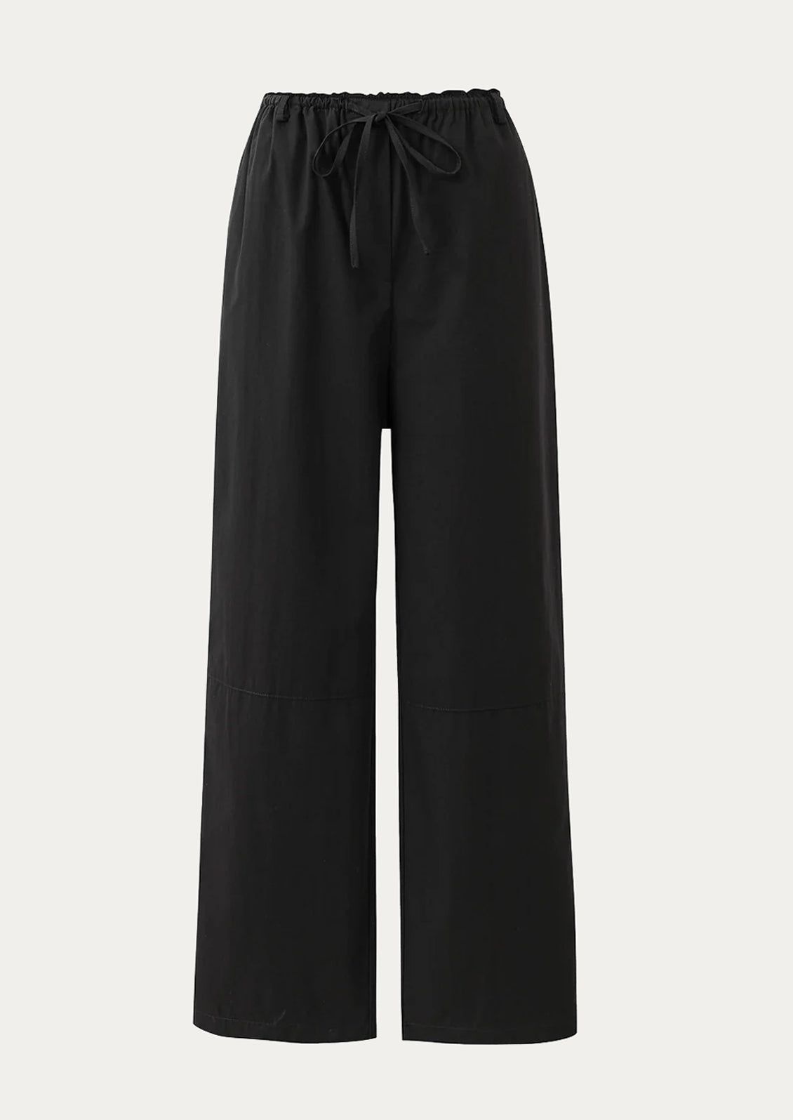 A pair of black cotton straight leg pants with drawstring waistband.