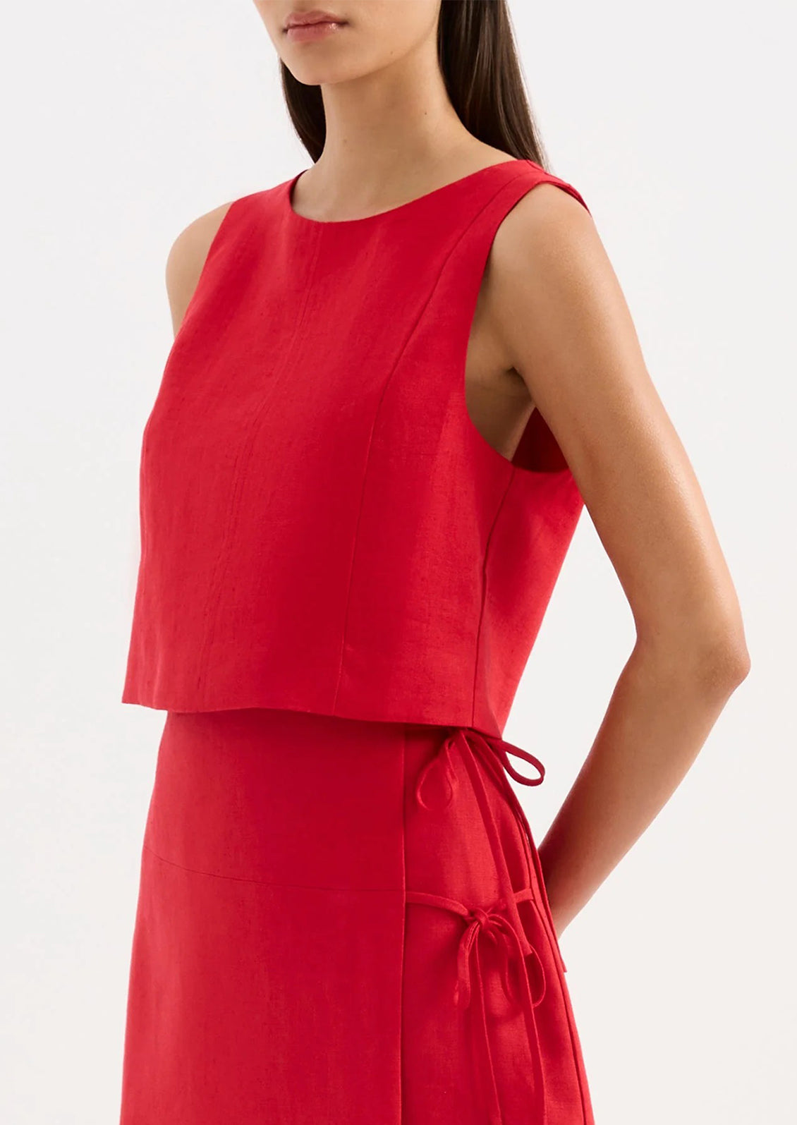 Red sleeveless top and skirt set on a white background