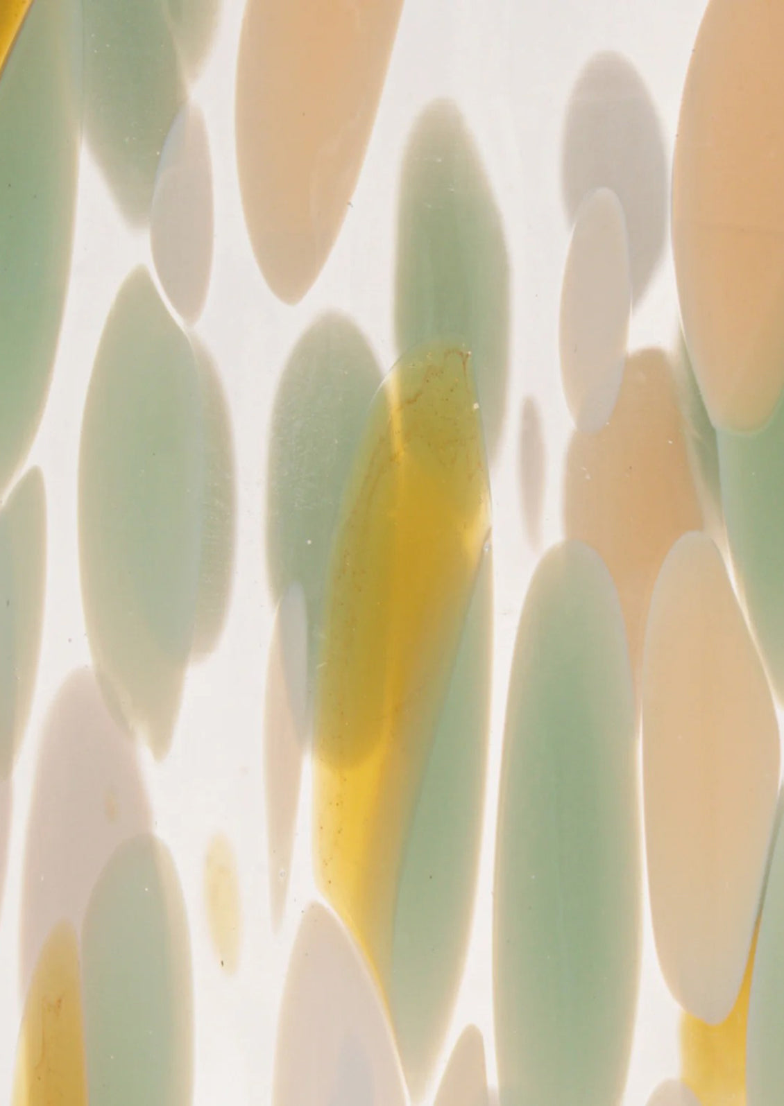 Close-up of textured surface with green and yellow colors