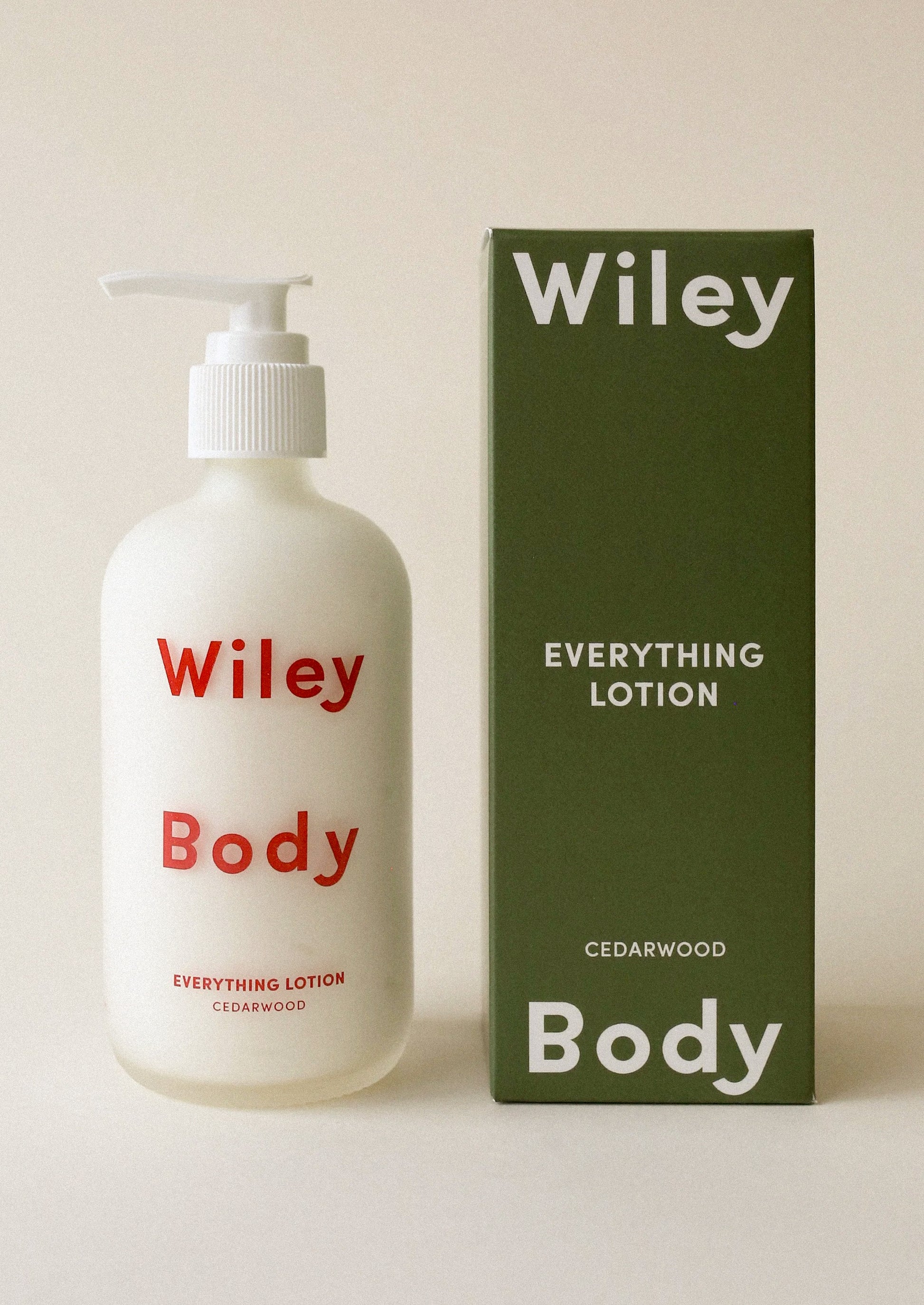Wiley Body lotion bottle and packaging on a beige background