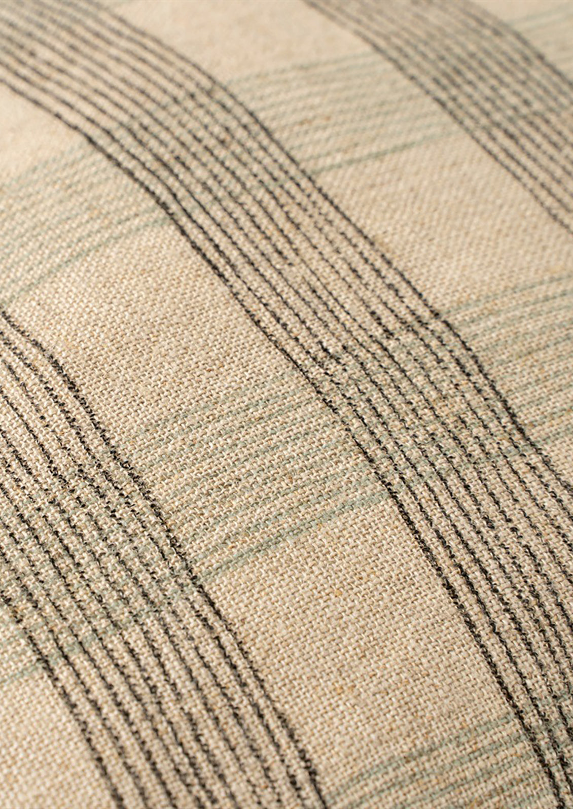 Plaid patterned natural linen pillow.