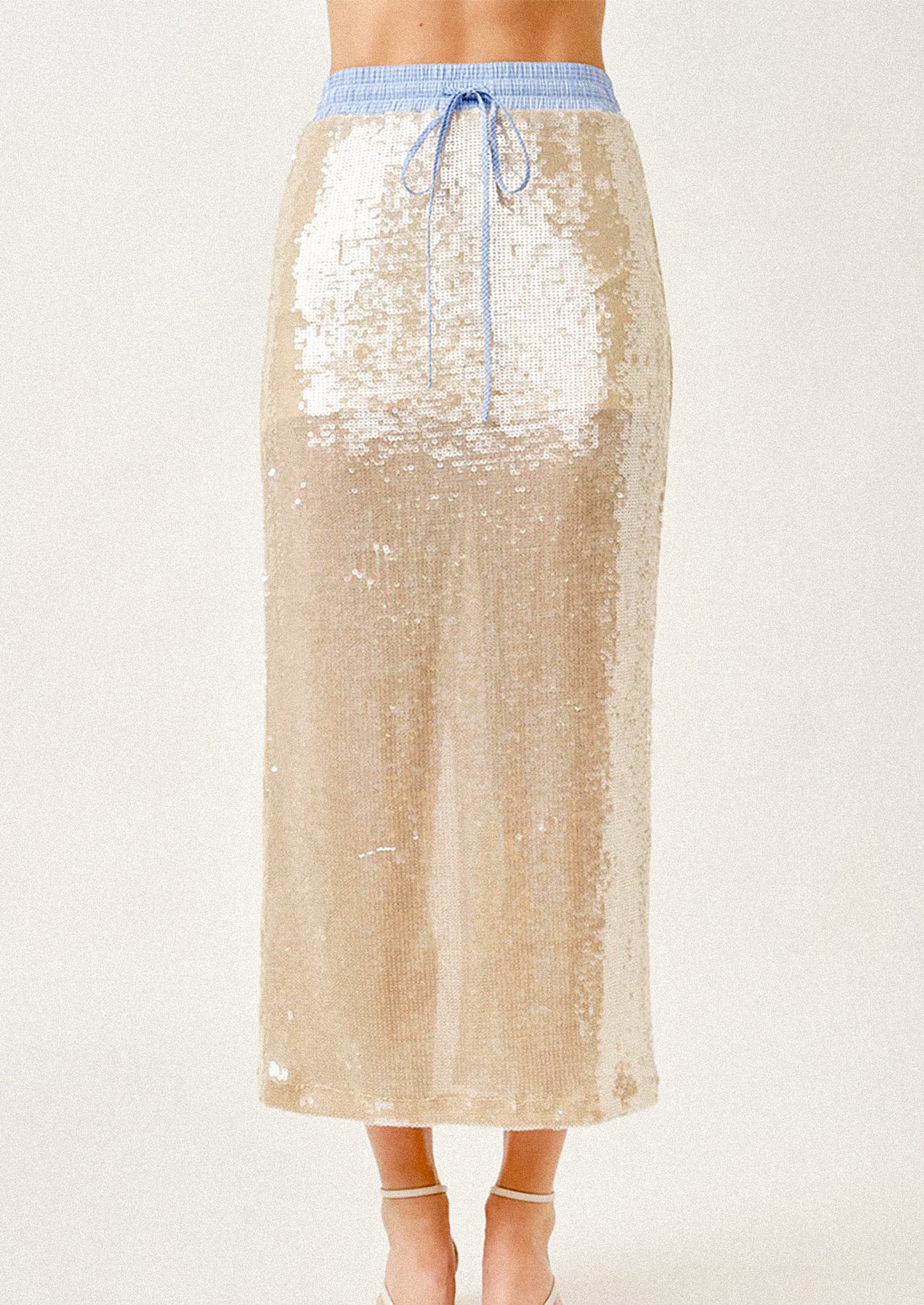 Champagne sequin skirt with blue drawstring on a white background