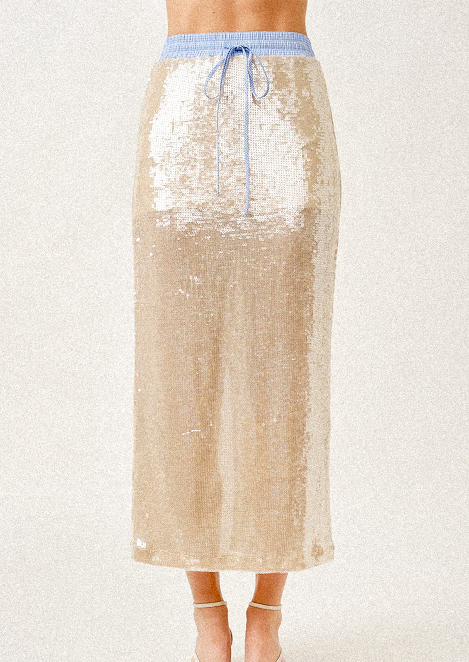 Champagne sequin skirt with blue drawstring on a white background