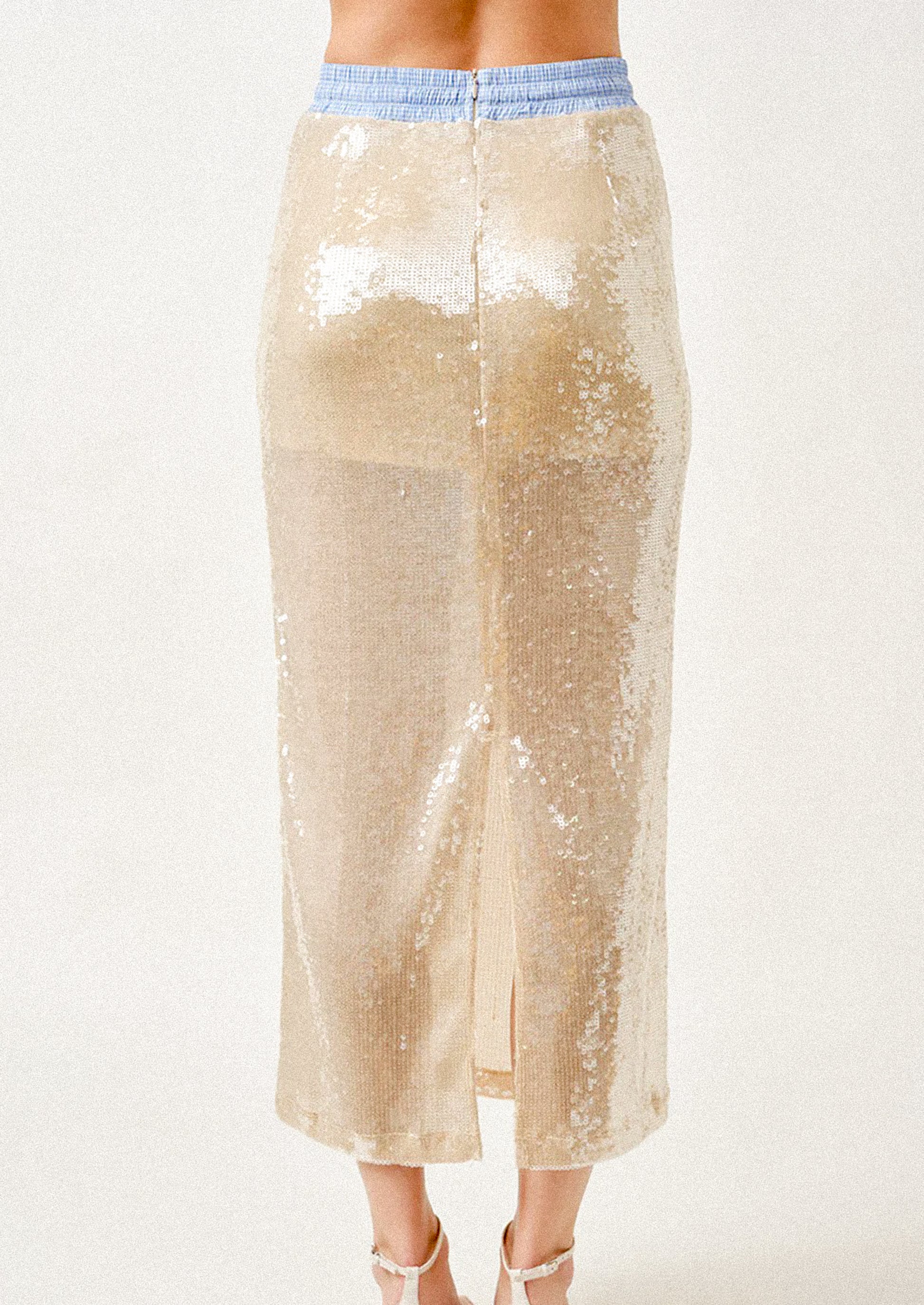 Champagne sequin skirt with blue drawstring on a white background