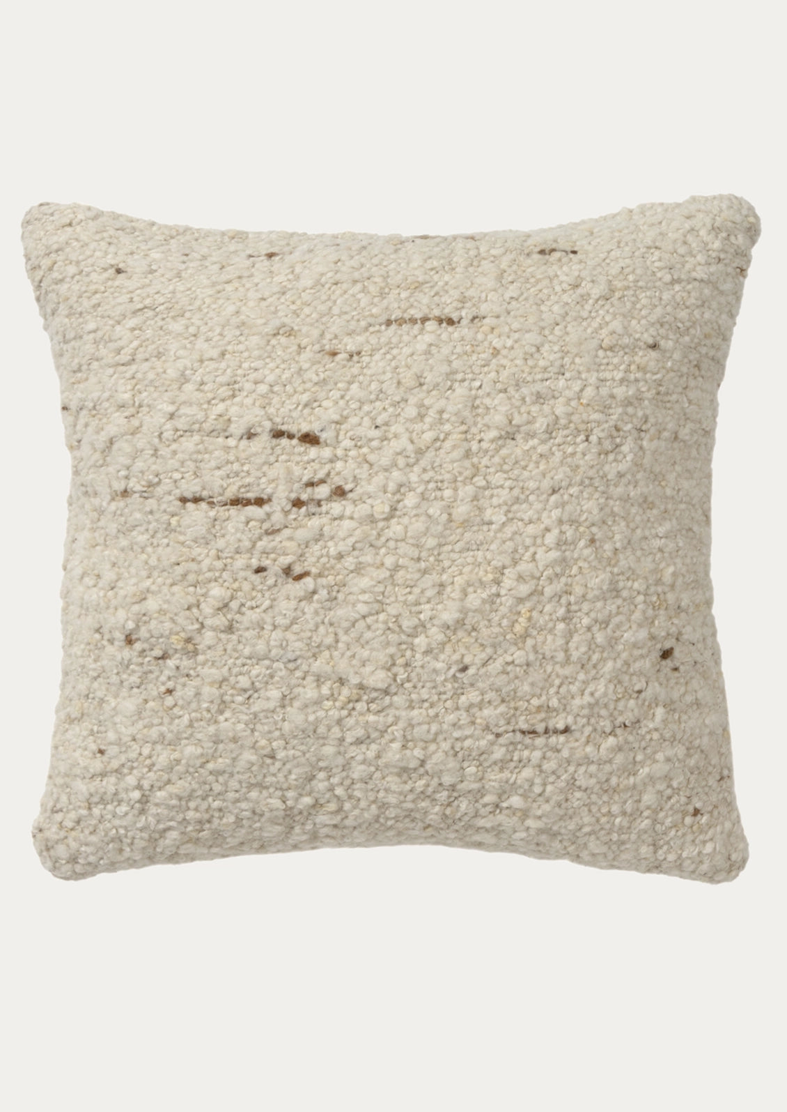 A square throw pillow with a textured, looped bouclé fabric in a cream color.