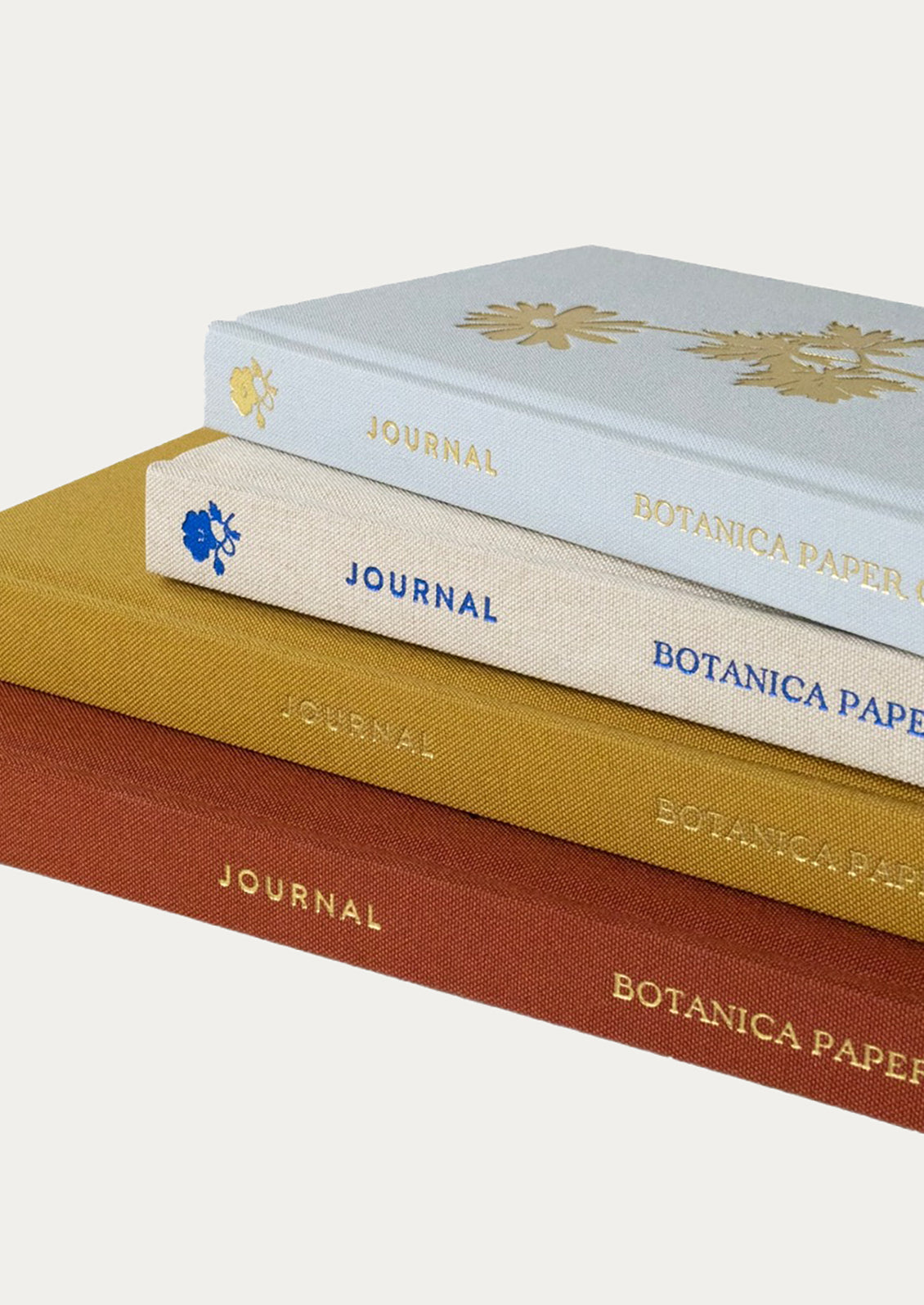 Assorted cloth bound journals.