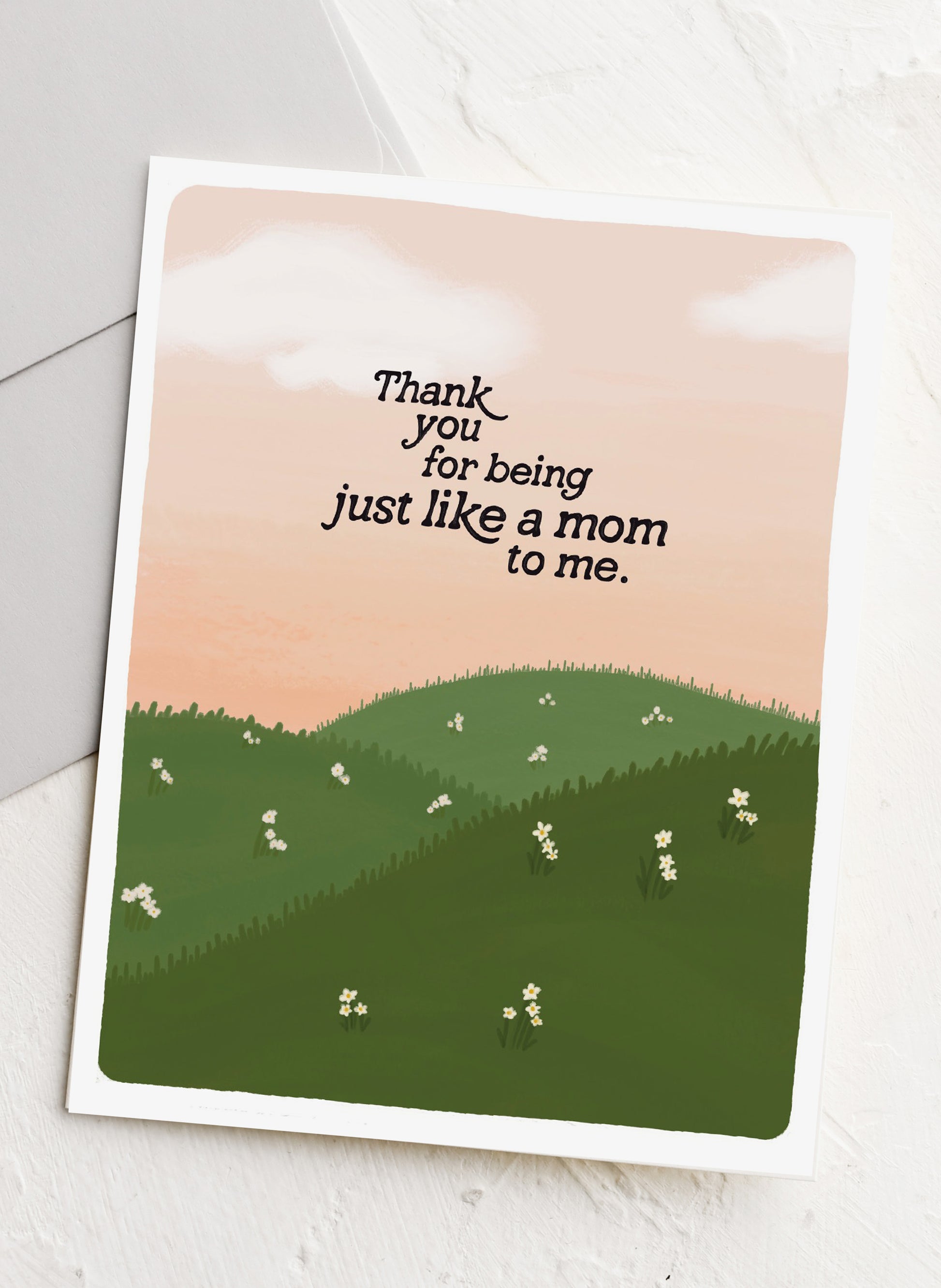 Greeting card with a scenic design and text on a white background