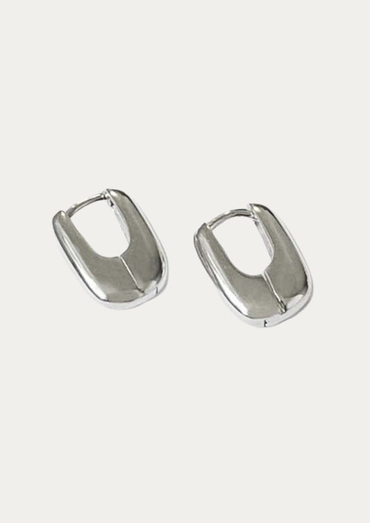 A pair of sterling silver hoop earrings.