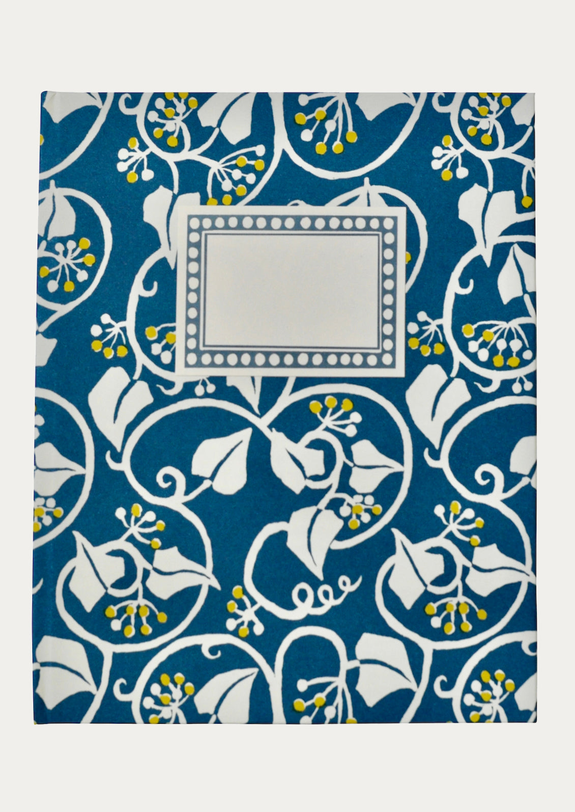 Patterned notebook with blue, white, and yellow design on a white background