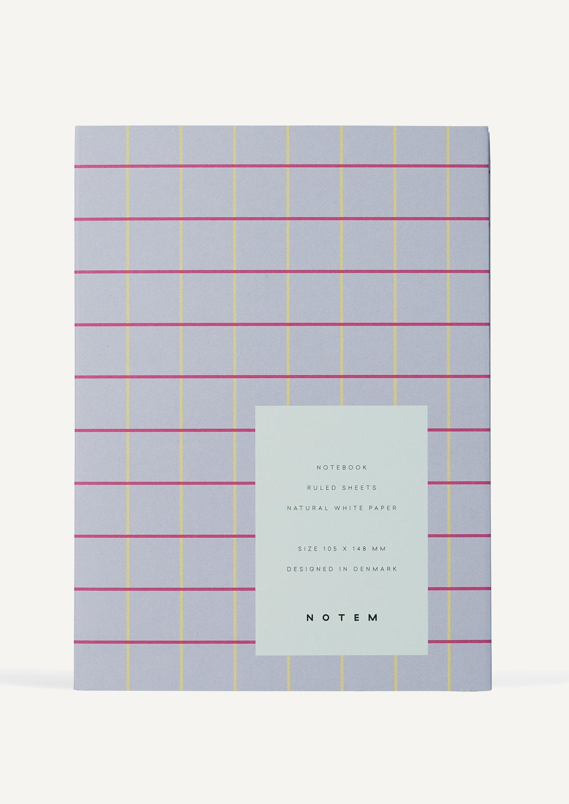 A notebook in lavender with pink and yellow grid check pattern.