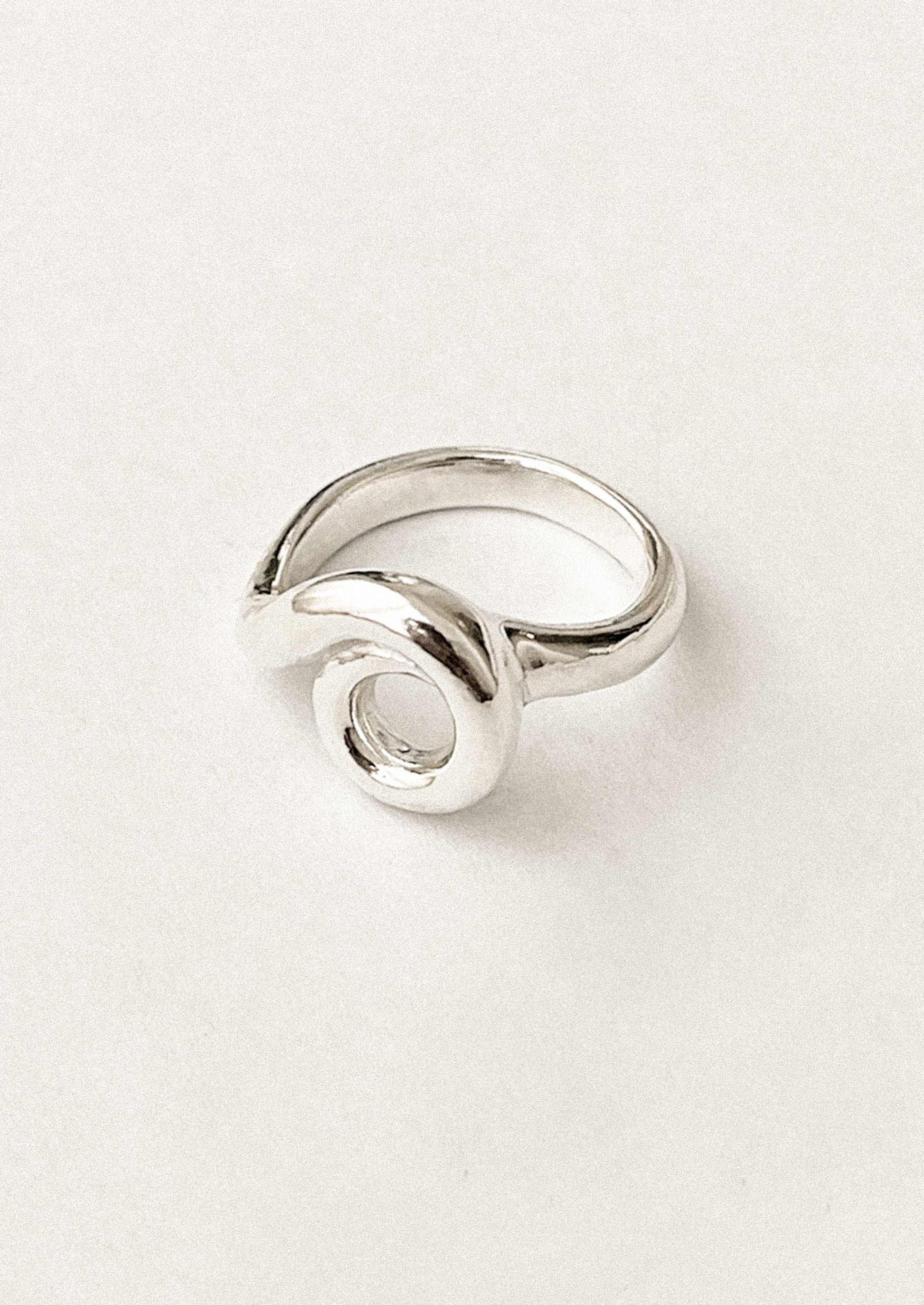 A sterling silver ring in circle shape.