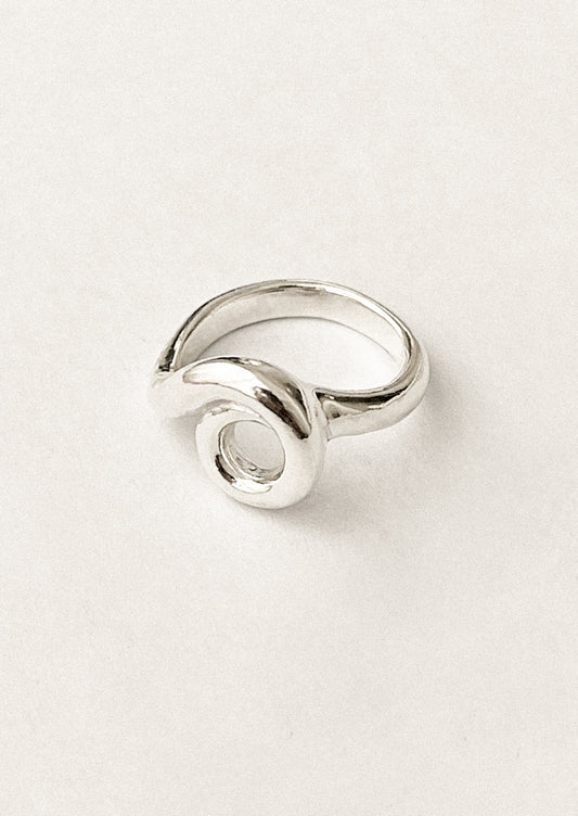A sterling silver ring in circle shape.