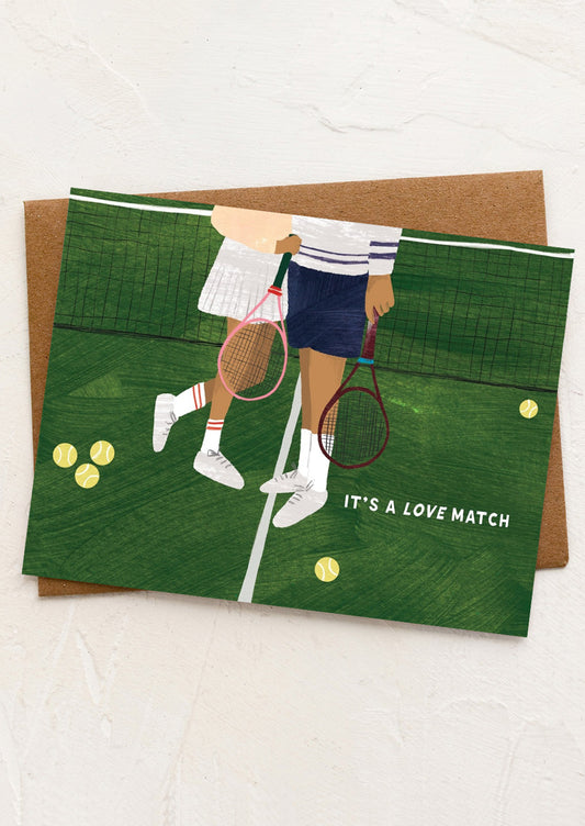 Card with illustration of two people holding hands on a tennis court with the text 'It's a Love Match'.