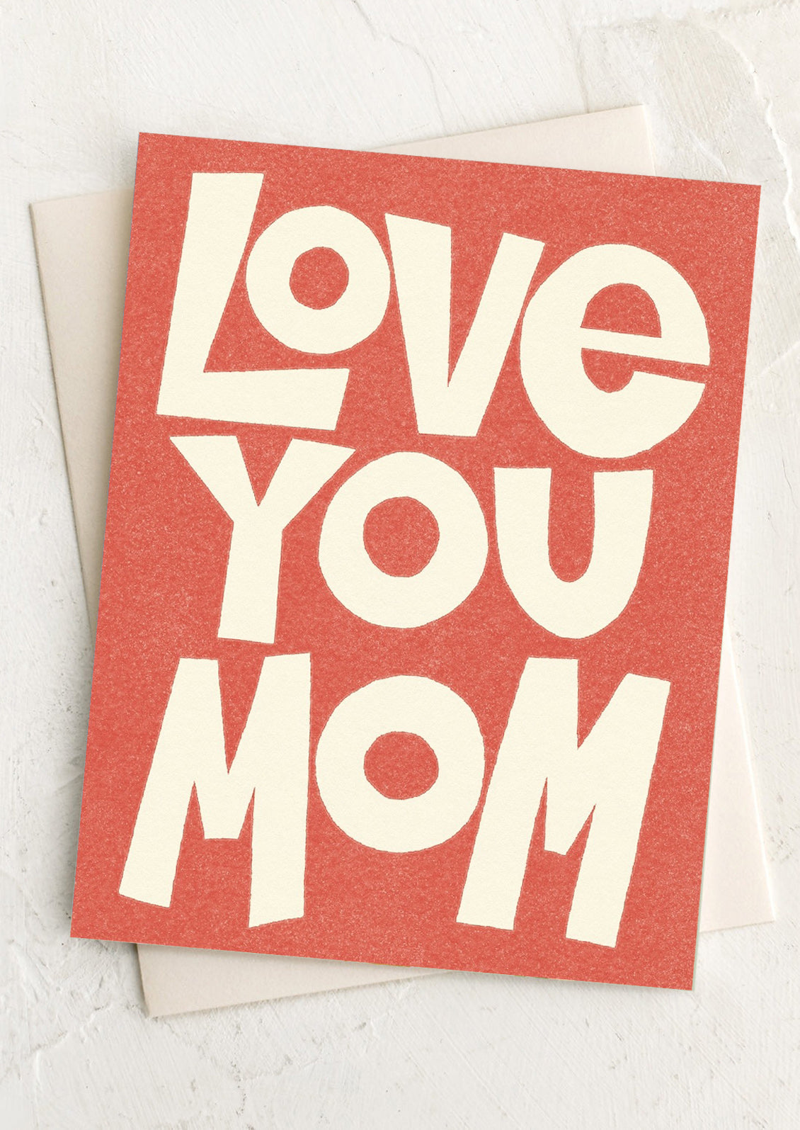 Card with 'Love You Mom' text on a red background