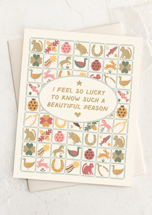 Greeting card with decorative pattern and text on a white background