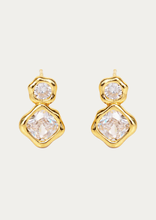 A pair of gold earrings with two stacked crystal gems.