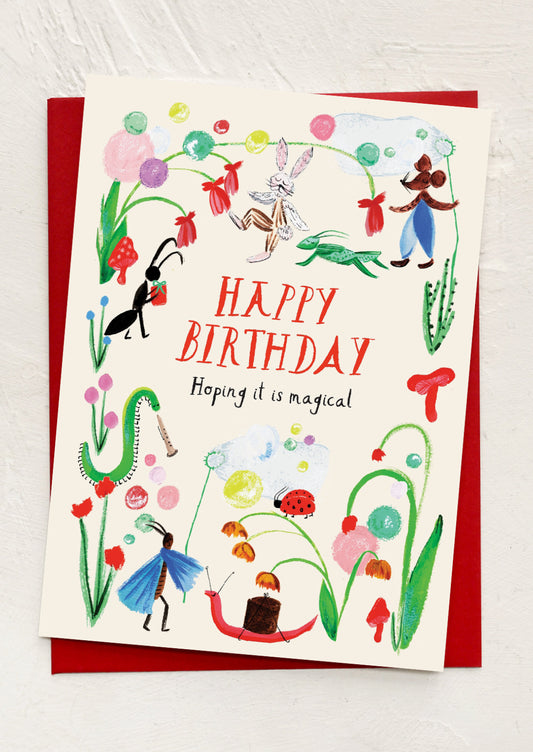 Birthday card with colorful illustrations and 'Happy Birthday' text on a white background