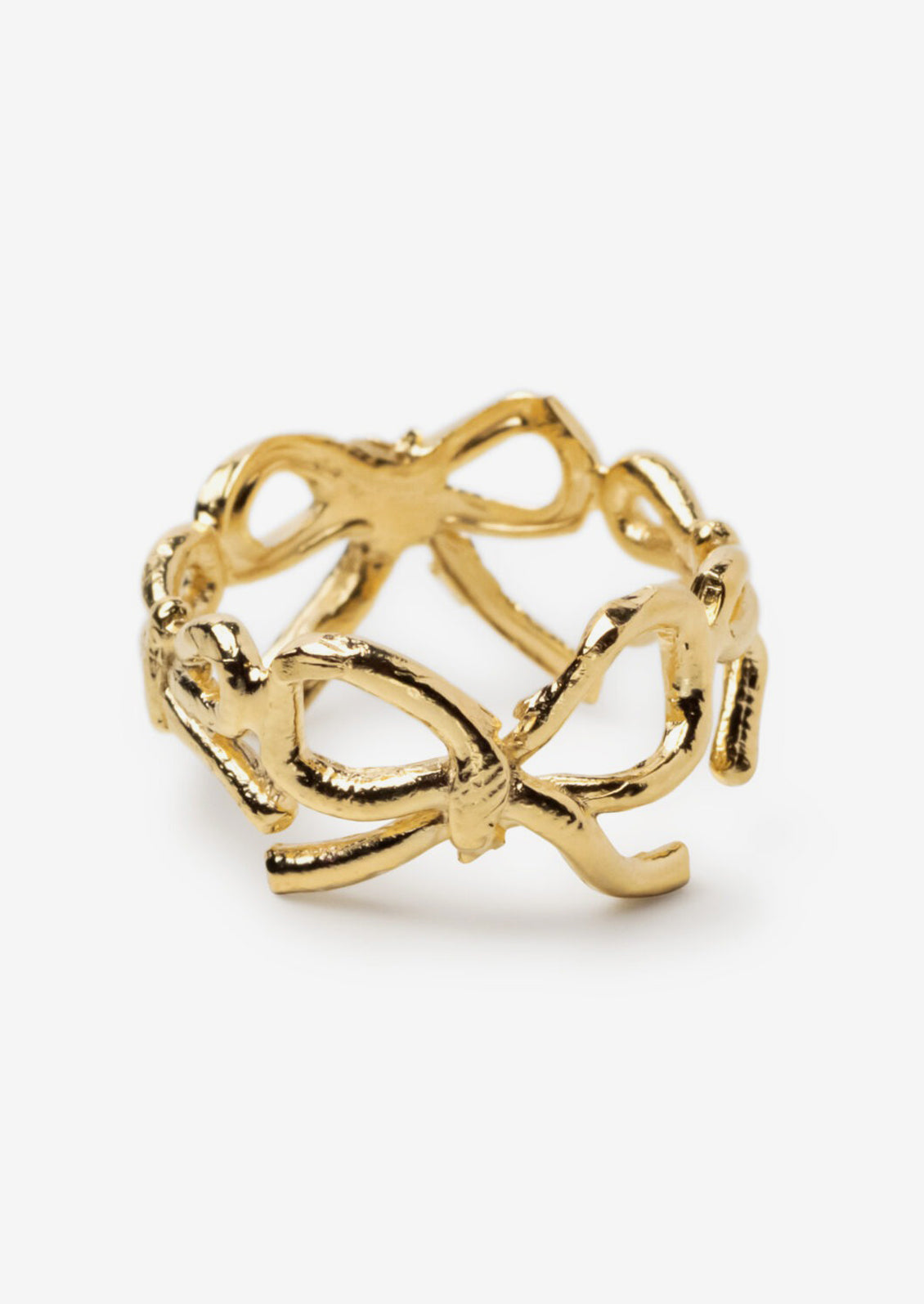 A gold ring with allover open bow shape.