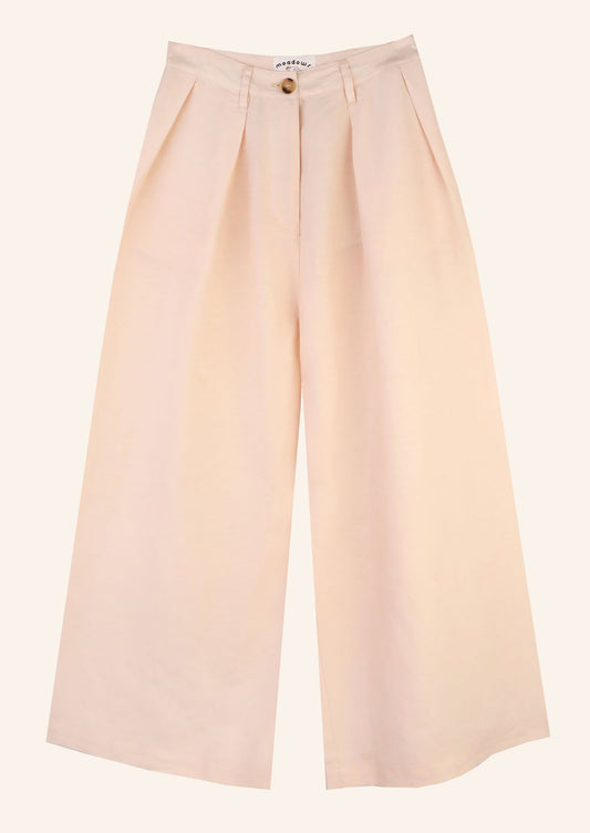 Light pink wide leg pants with pleat detail at waist.