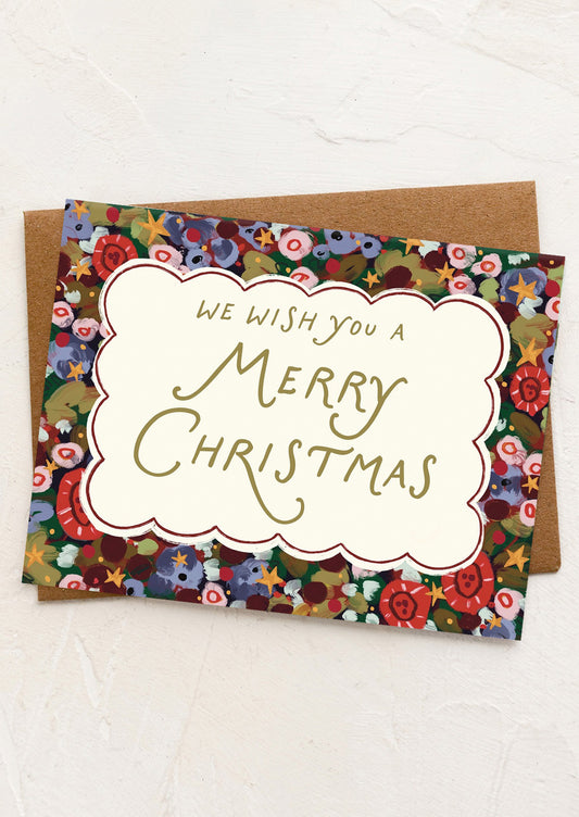 Christmas card with floral design and 'Merry Christmas' text on a white background