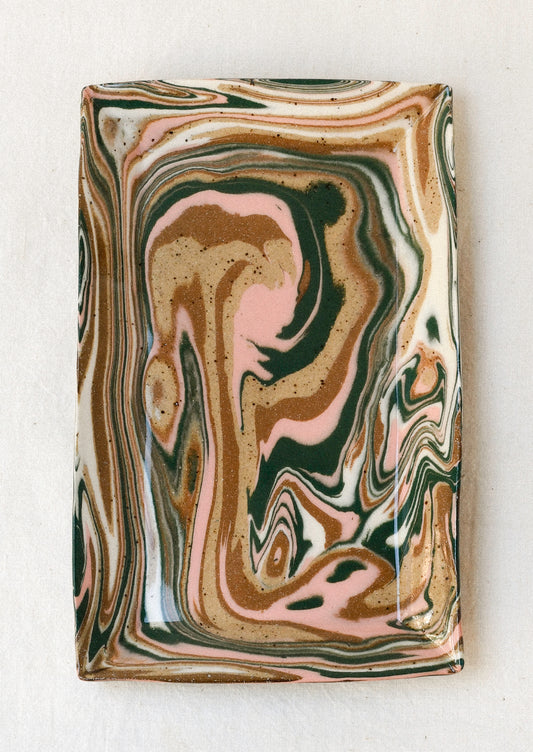 Handmade rectangular catchall tray with a pink, green and brown marble design.