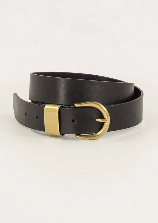 Black leather belt with a gold buckle on a light gray background