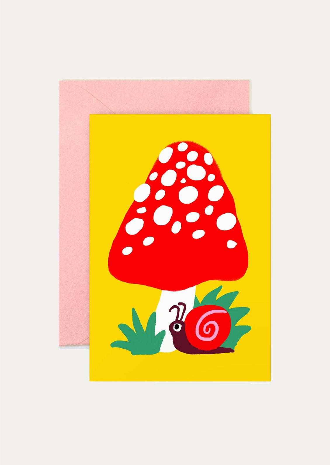 Greeting card with a red mushroom and snail design on a yellow background