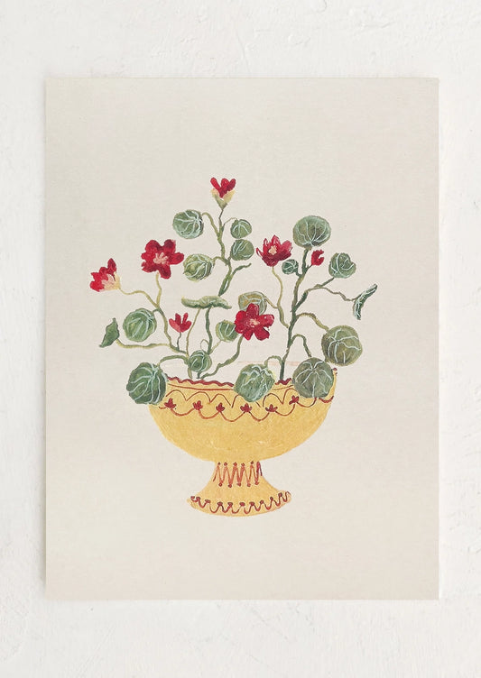 An art print of a painting of crimson nasturtiums in a yellow compote bowl.