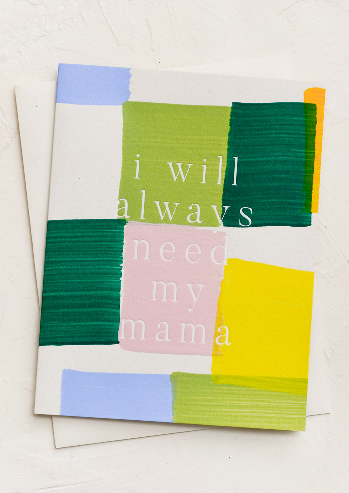 A plaid print card reading "I will always need my mama".