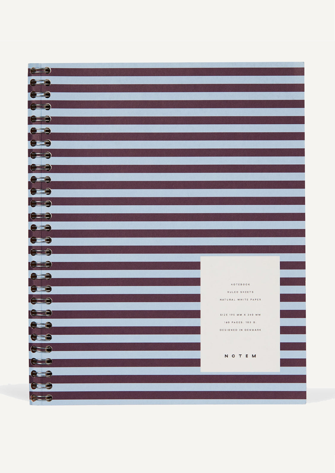 A spiral bound notebook with striped cover in sky blue and bordeaux.