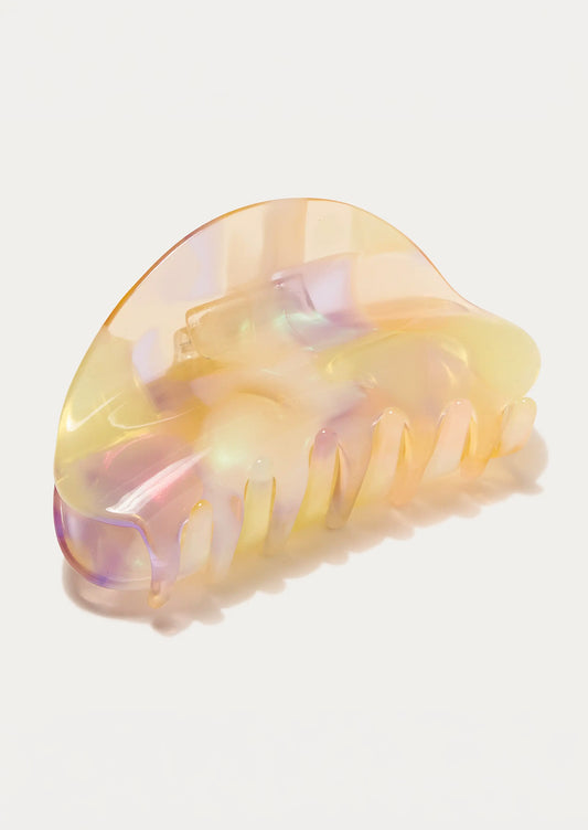 A hair claw with an iridescent opal design.