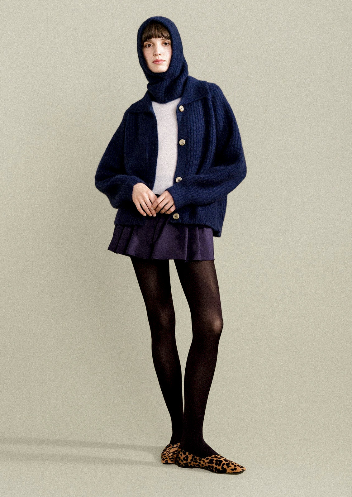 A woman wearing opaque black tights.