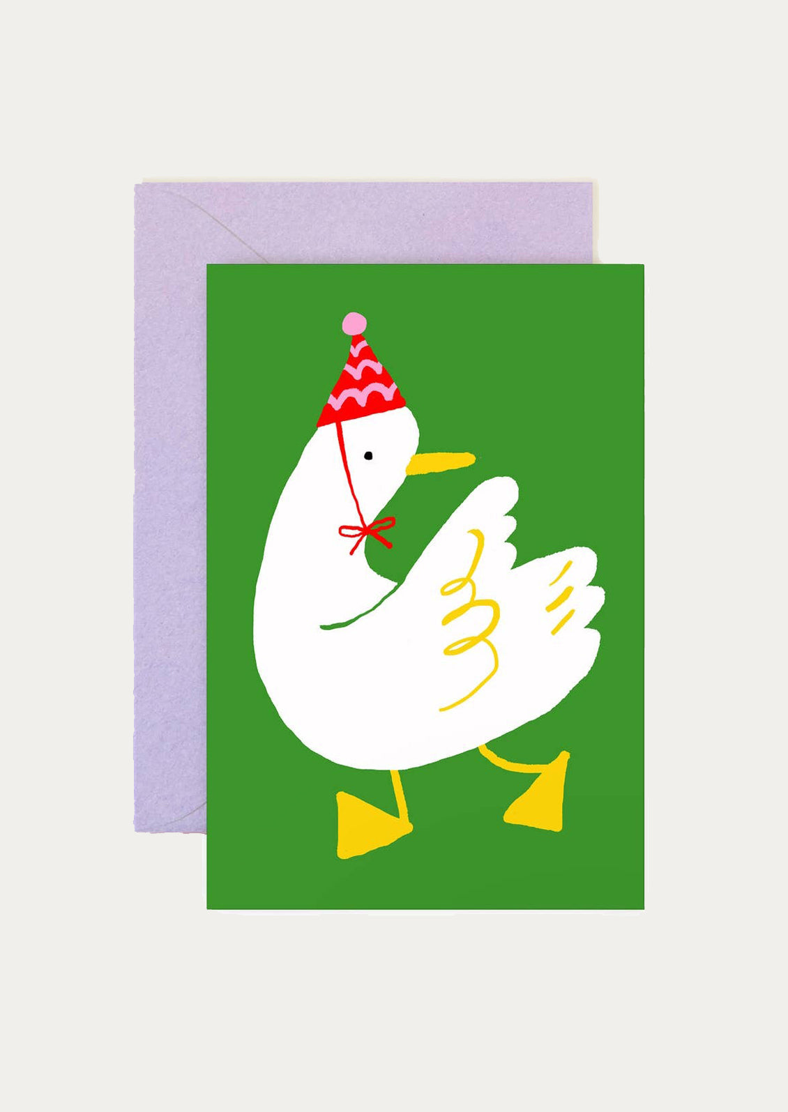 Greeting card with a cartoon duck wearing a party hat on a green background
