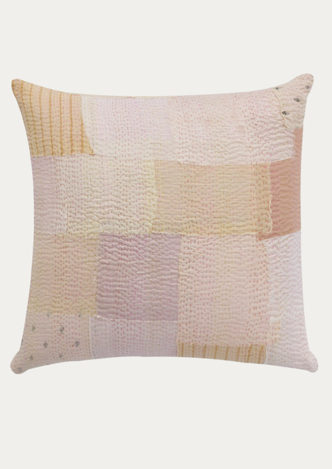 Patchwork pillow with a textured pattern on a white background