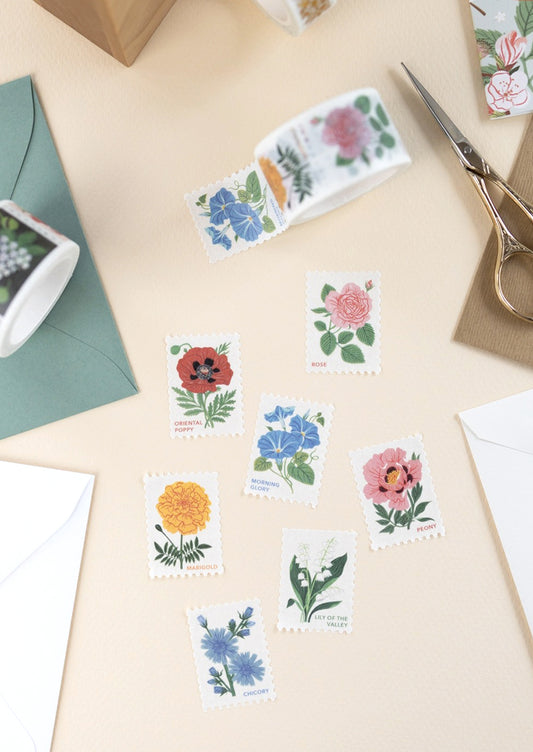 Floral stamp washi tape with perforated design.