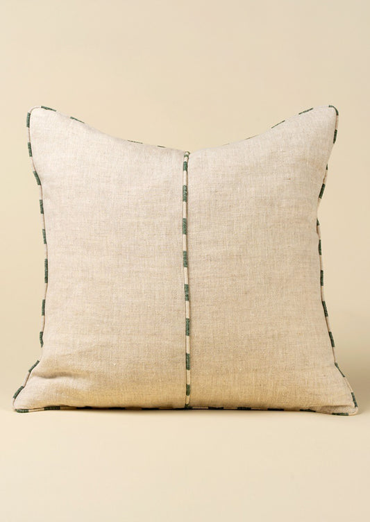 Natural linen pillow with a central stripe on a beige background